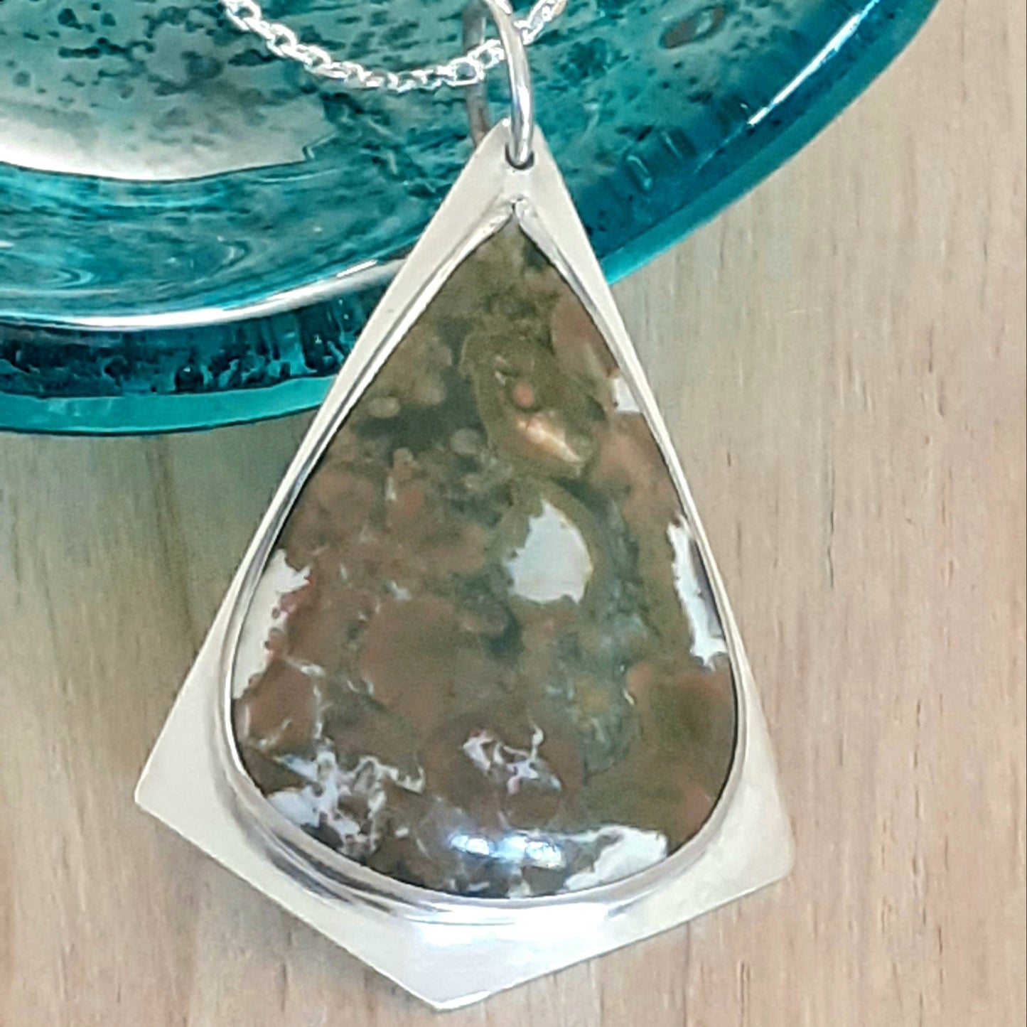 Geometric Shape with Teardrop Stone and Hidden Flowers