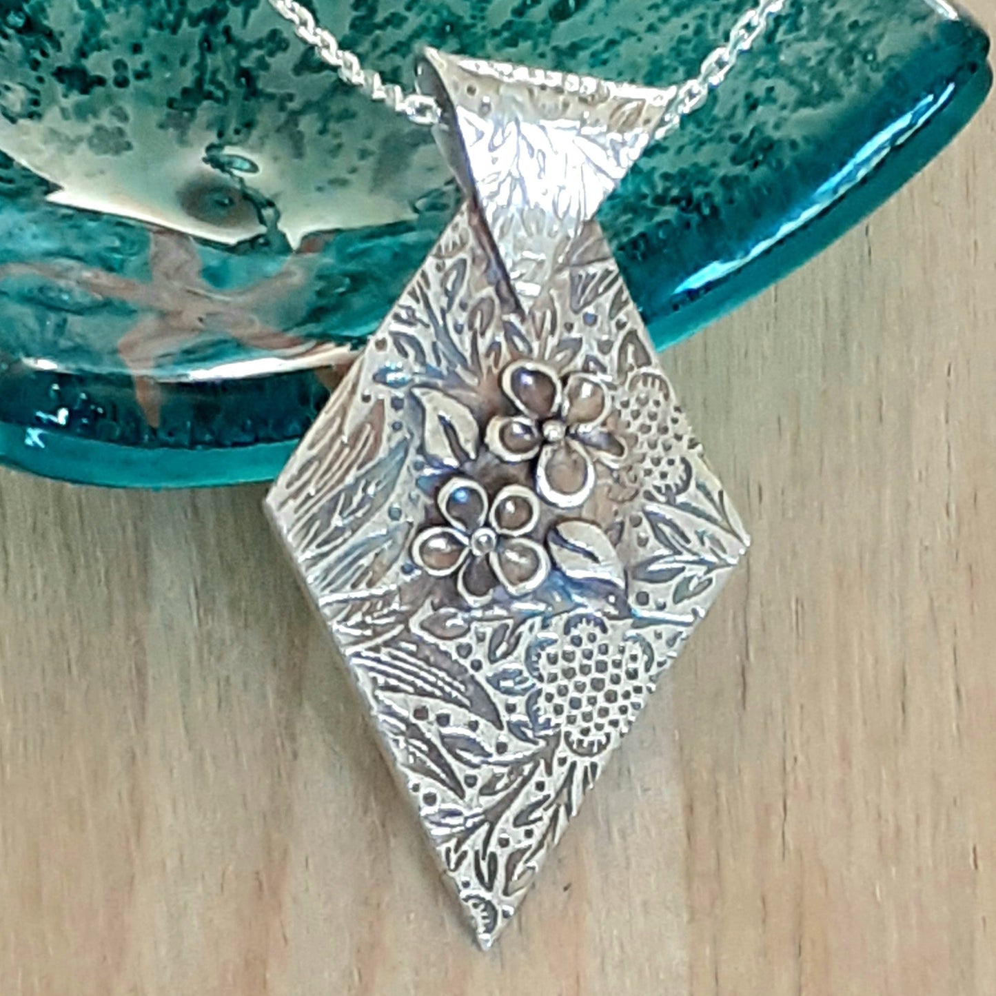 Diamond Shaped Pendant with Handcrafted Flowers
