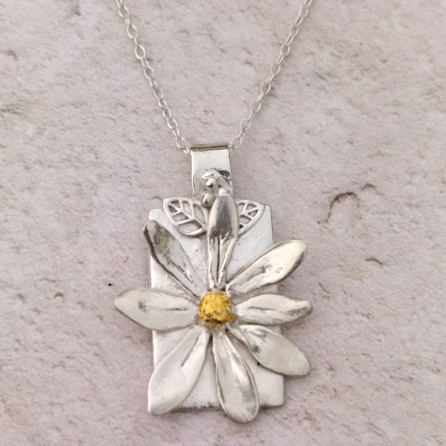 Silver Daisy with a Hint of Gold