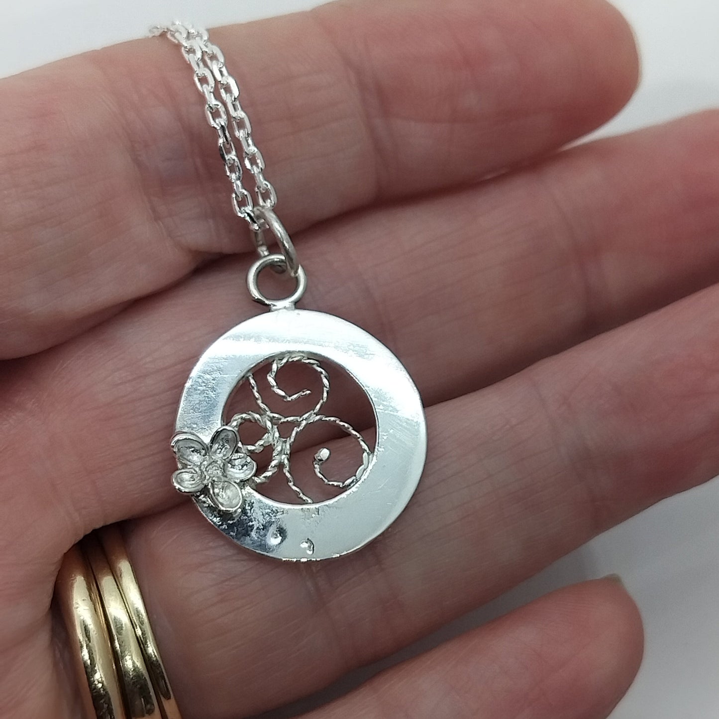 Circular Pendant with Filigree Inset and Flower