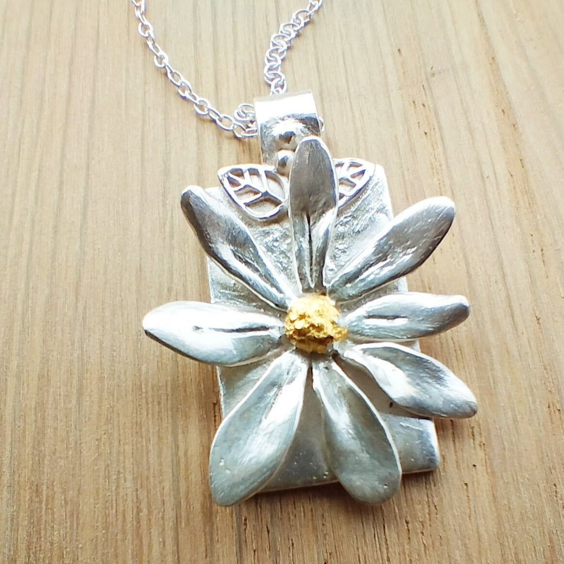 Silver Daisy with a Hint of Gold