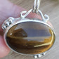 Two Little Birds Oval Tigers Eye Stone