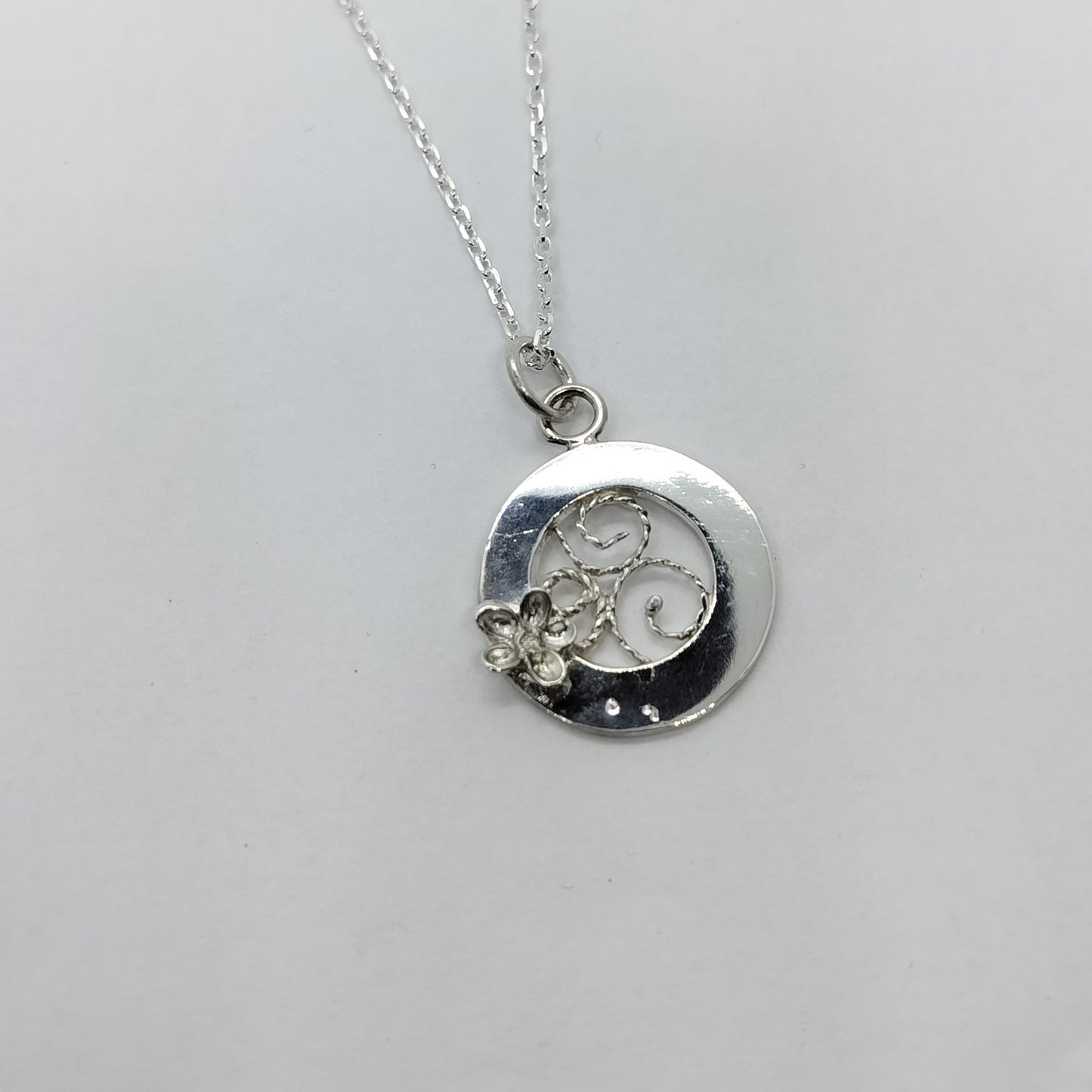 Circular Pendant with Filigree Inset and Flower
