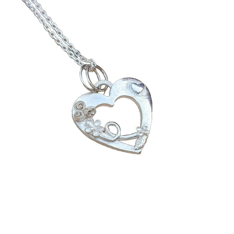 Open Heart with Intricate Flowers